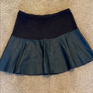 Black and leather on the bottom skirt.